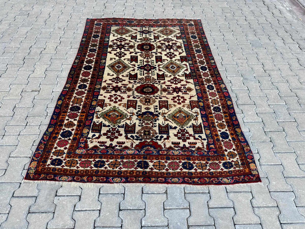 5x8 Antique Turkish Wool Rug: Handcrafted Boho Area Rug