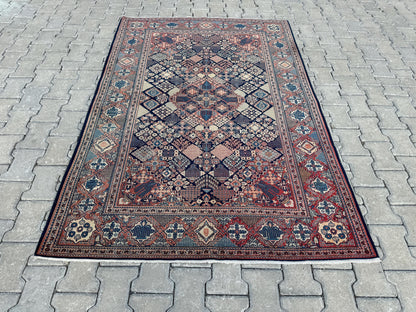 5x7 Antique Turkish Wool Rug: Handcrafted Bohemian Area Rug