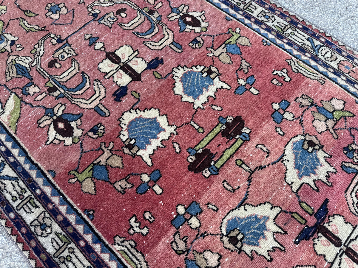 3x9 Tribal Persian Rug: Hand Woven, Faded Red and Black Pattern