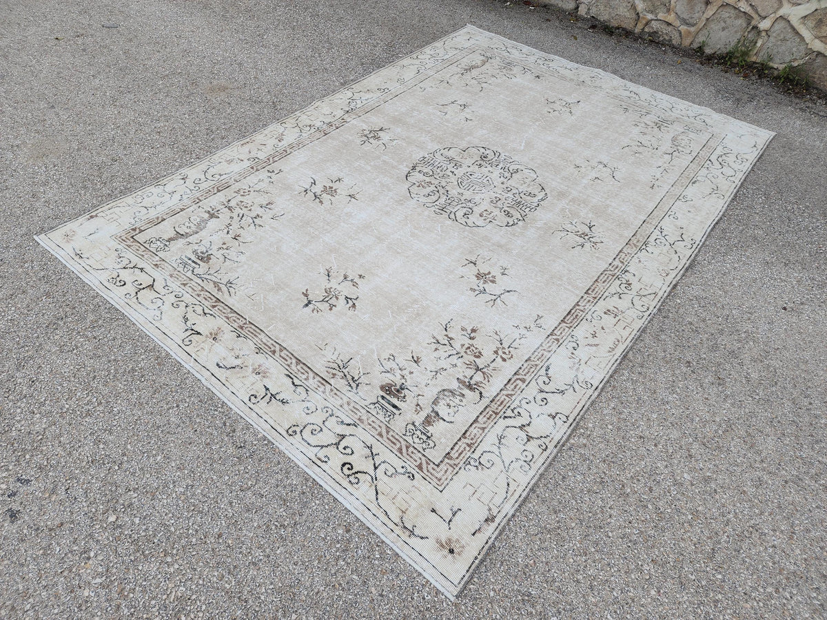 Vintage Oushak Wool Rug 7x10: Muted Medallion Turkish Design