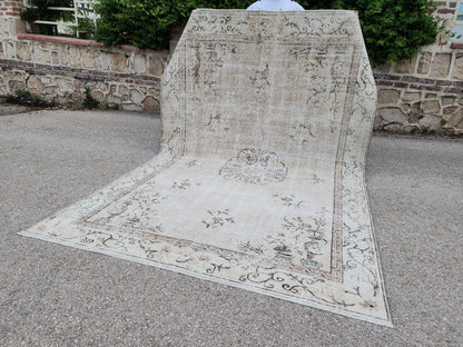 Vintage Oushak Wool Rug 7x10: Muted Medallion Turkish Design