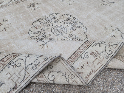 Vintage Oushak Wool Rug 7x10: Muted Medallion Turkish Design