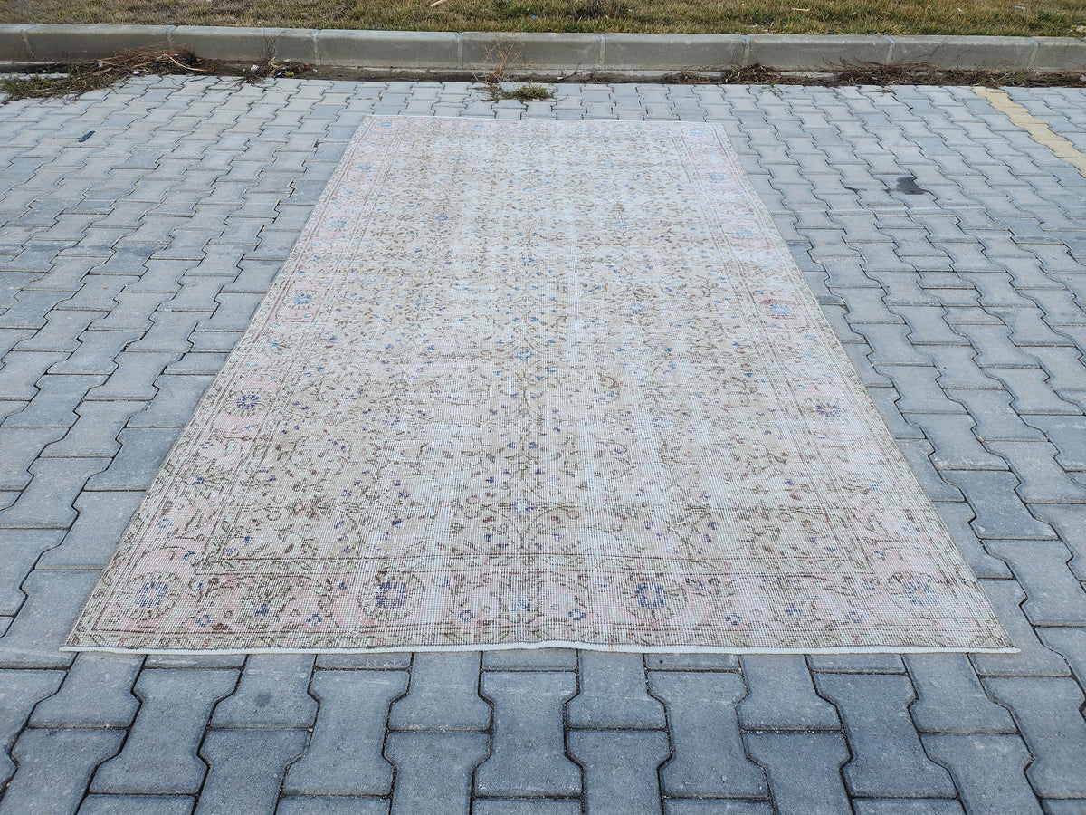 Vintage Oushak Rug 5x8: Hand-Knotted Beige Oriental Rug