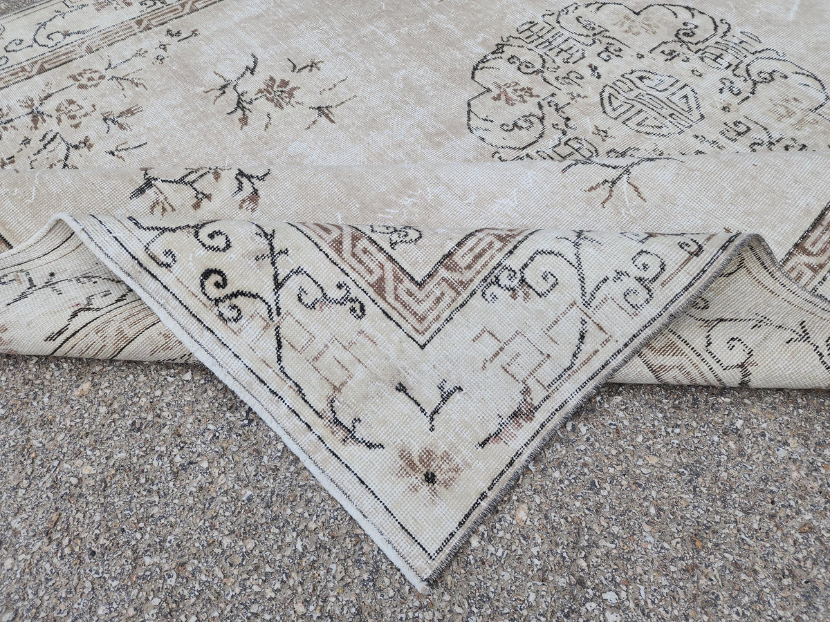 Vintage Oushak Wool Rug 7x10: Muted Medallion Turkish Design