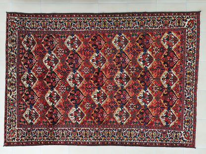 Vintage Bakhtiari Wool Rug 7x10 ft – Hand Knotted Persian Tribal Red Diamond Area Rug (1970s)- sku2101