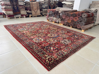 Vintage Bakhtiari Wool Rug 7x10 ft – Hand Knotted Persian Style Red Patchwork Area Rug (1960s)- sku2100