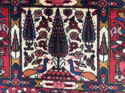 Vintage Bakhtiari Wool Rug 7x10 ft – Hand Knotted Persian Style Red Patchwork Area Rug (1960s)- sku2100