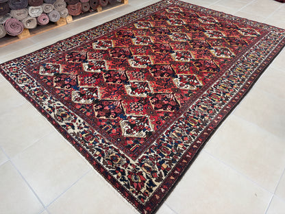 Vintage Bakhtiari Wool Rug 7x10 ft – Hand Knotted Persian Tribal Red Diamond Area Rug (1970s)- sku2101
