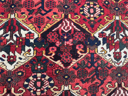 Vintage Bakhtiari Wool Rug 7x10 ft – Hand Knotted Persian Tribal Red Diamond Area Rug (1970s)- sku2101