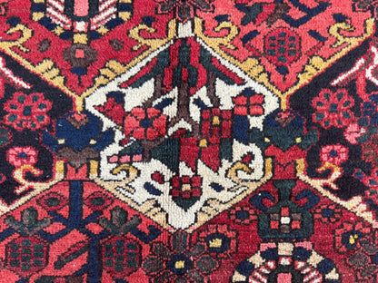 Vintage Bakhtiari Wool Rug 7x10 ft – Hand Knotted Persian Tribal Red Diamond Area Rug (1970s)- sku2101