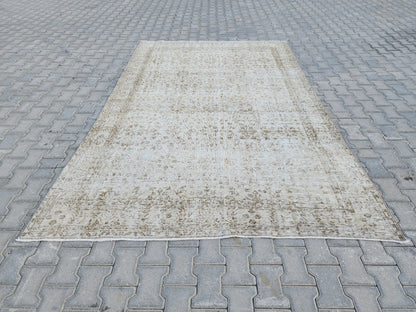 Wool Turkish Rug 6x10: Beige Isparta Rug, Muted Design