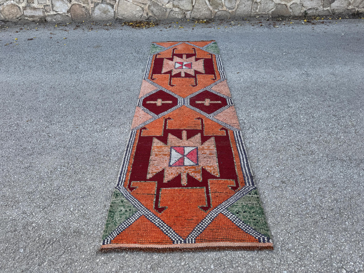 3x10 Herki Runner Rug: Vintage Handwoven Wool in Burnt Orange and Green Tribal Motifs
