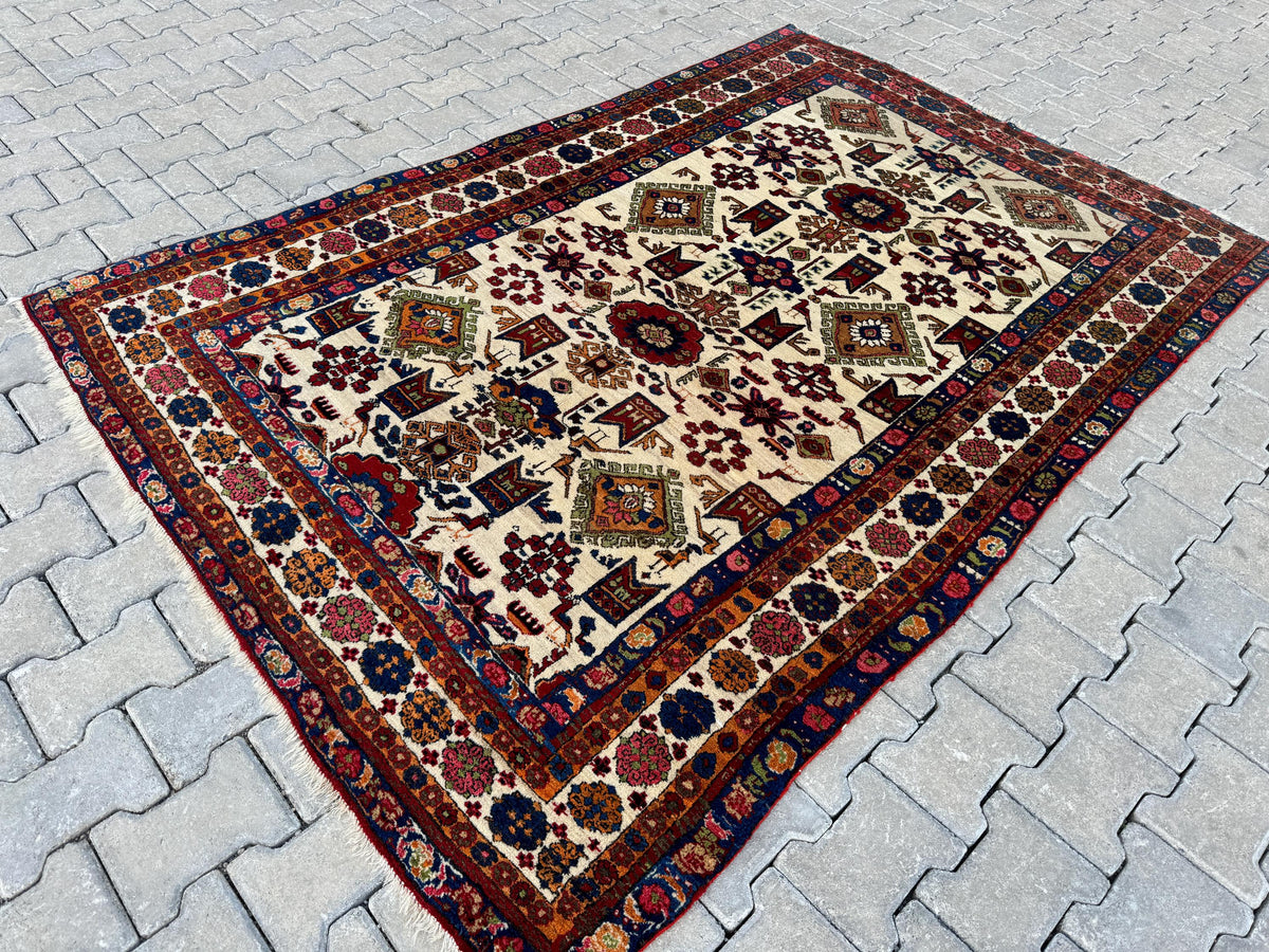 5x8 Antique Turkish Wool Rug: Handcrafted Boho Area Rug