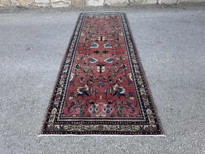 3x9 Tribal Persian Rug: Hand Woven, Faded Red and Black Pattern
